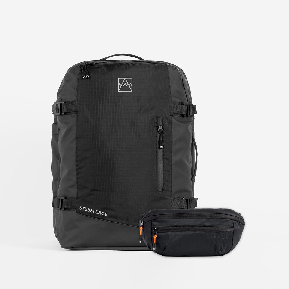 A studio shot of an Adventure Bag All Black / All Black Ultra Light Sling