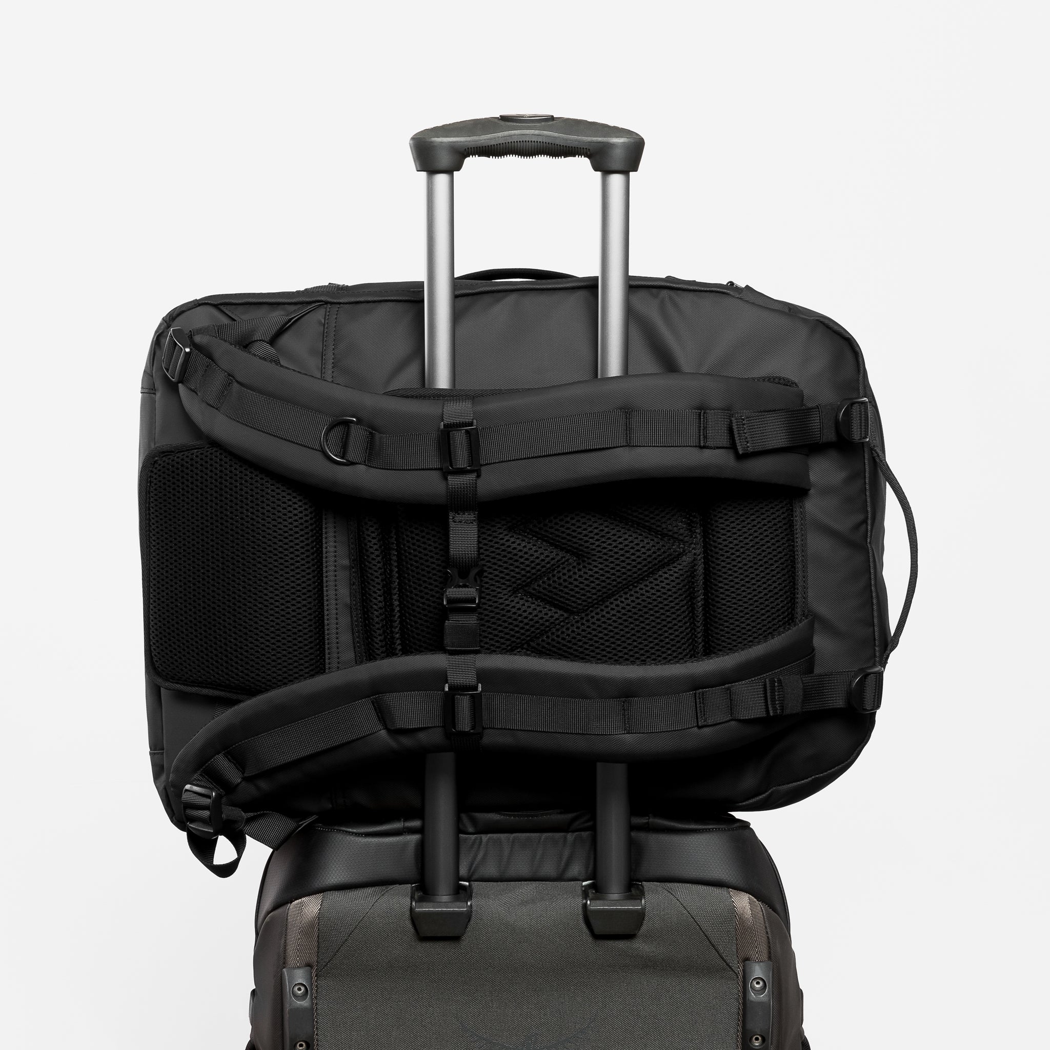 An Urban Green Adventure bag trolley sleeve on a suitcase