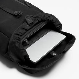 A studio shot of the interior and laptop compartment in a Backpack 20L in All Black