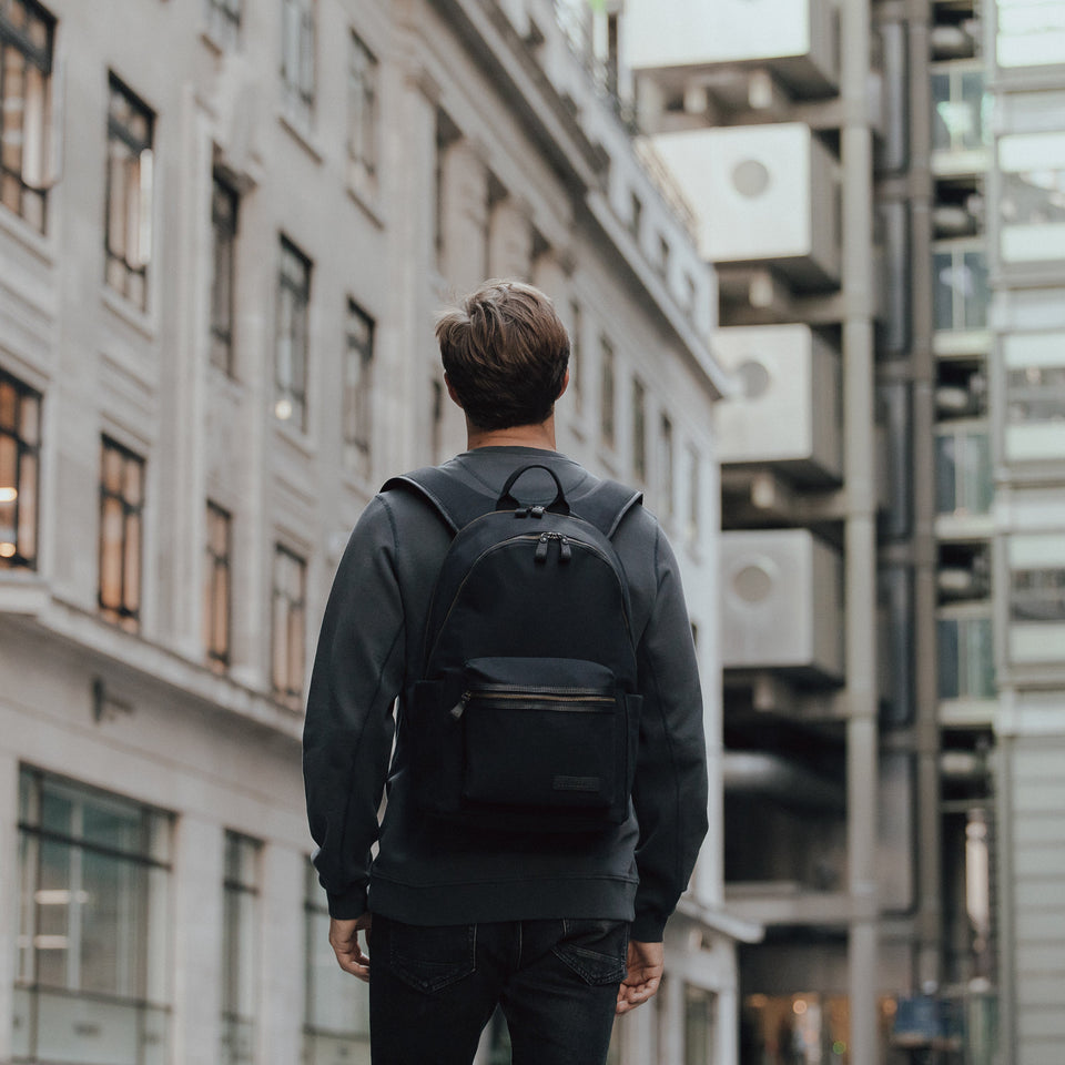 The Commuter Backpack in Black and Gold