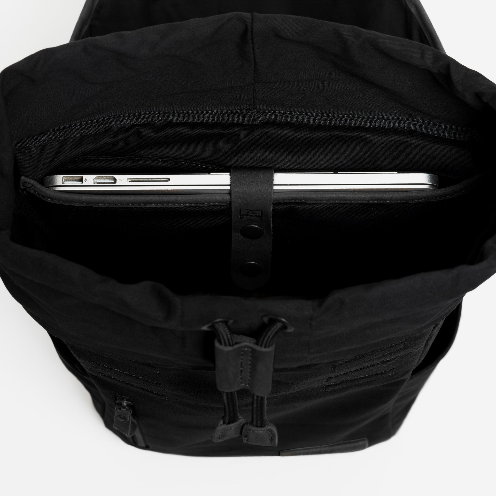 A studio shot of the interior of the Daypack Outlet in All Black