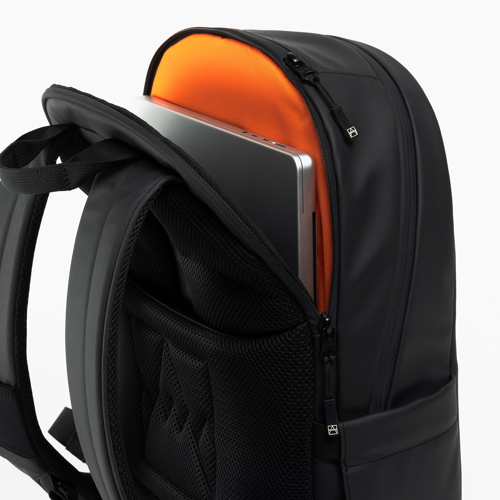 A studio shot of the  laptop compartment on the Everyday Backpack 15L in All Black