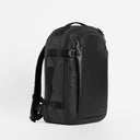 A studio shot of the front of the Hybrid Backpack 30L at a side angle in All Black