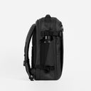 A studio shot of the side elasticated bottle pocket on the  Hybrid Backpack 30L in All Black