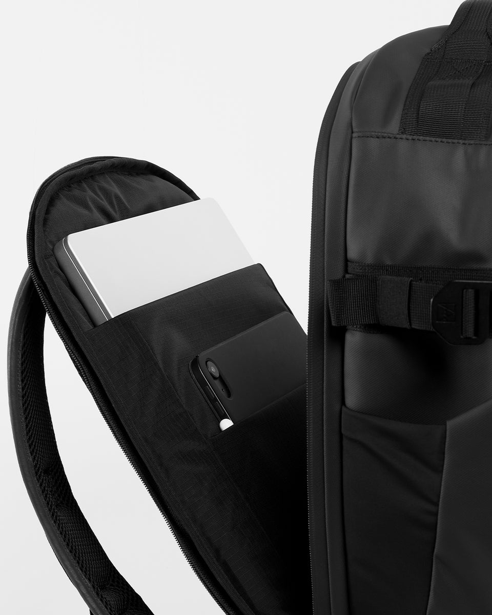 A studio shot of the Hybrid Backpack 30L and its tech organisation and laptop compartment