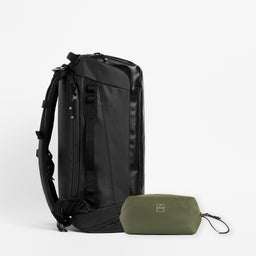 A studio shot of the Kit Bag in All Black / Urban Green Wash Bag bundle