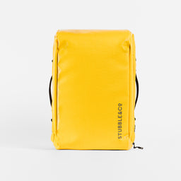 A studio shot of the waterproof base on a Kit Bag 30L in Yellow