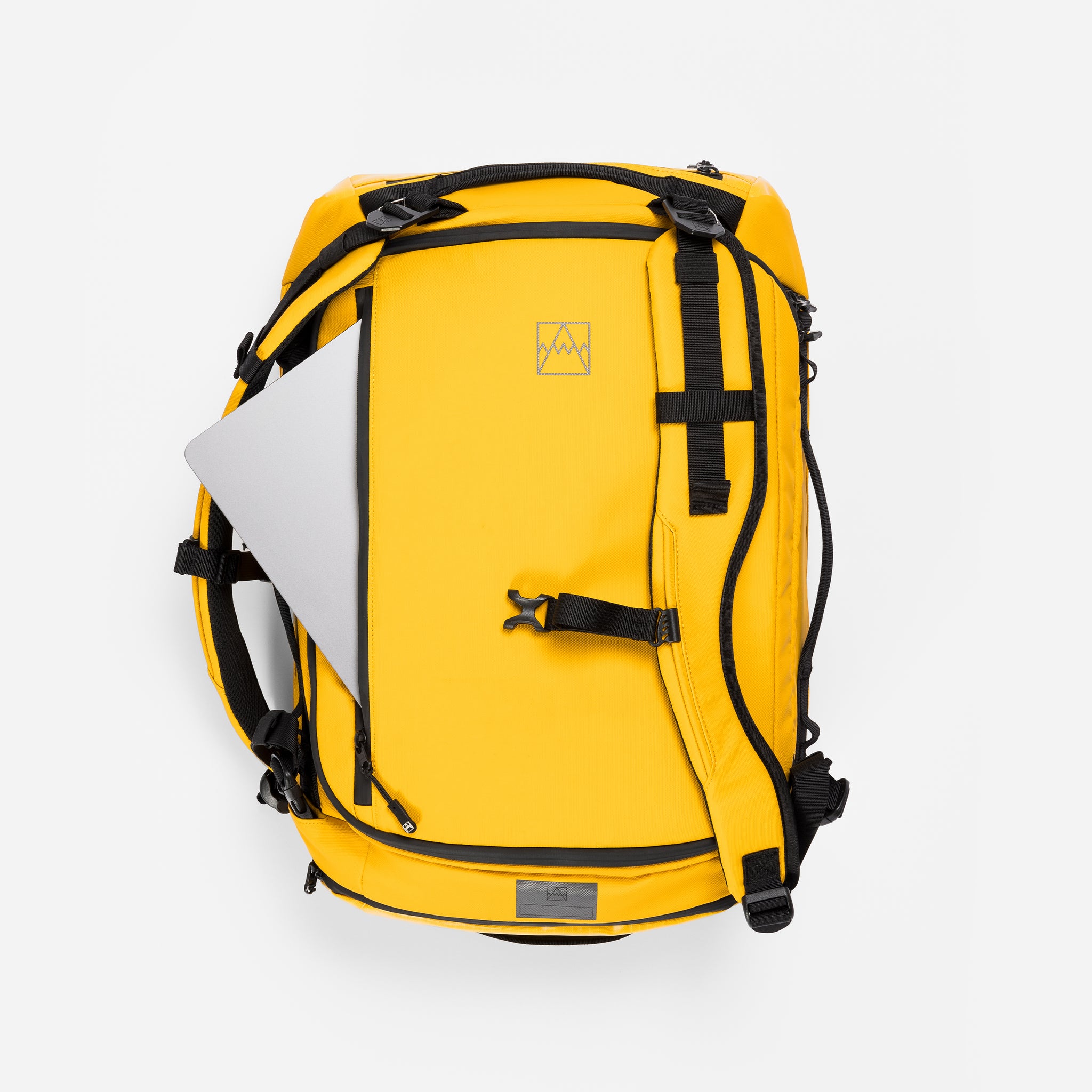 A studio shot of the laptop compartment in the Kit Bag 30L in Yellow