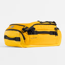 A studio shot of the side and end grab handles on a Kit Bag 30L in Yellow