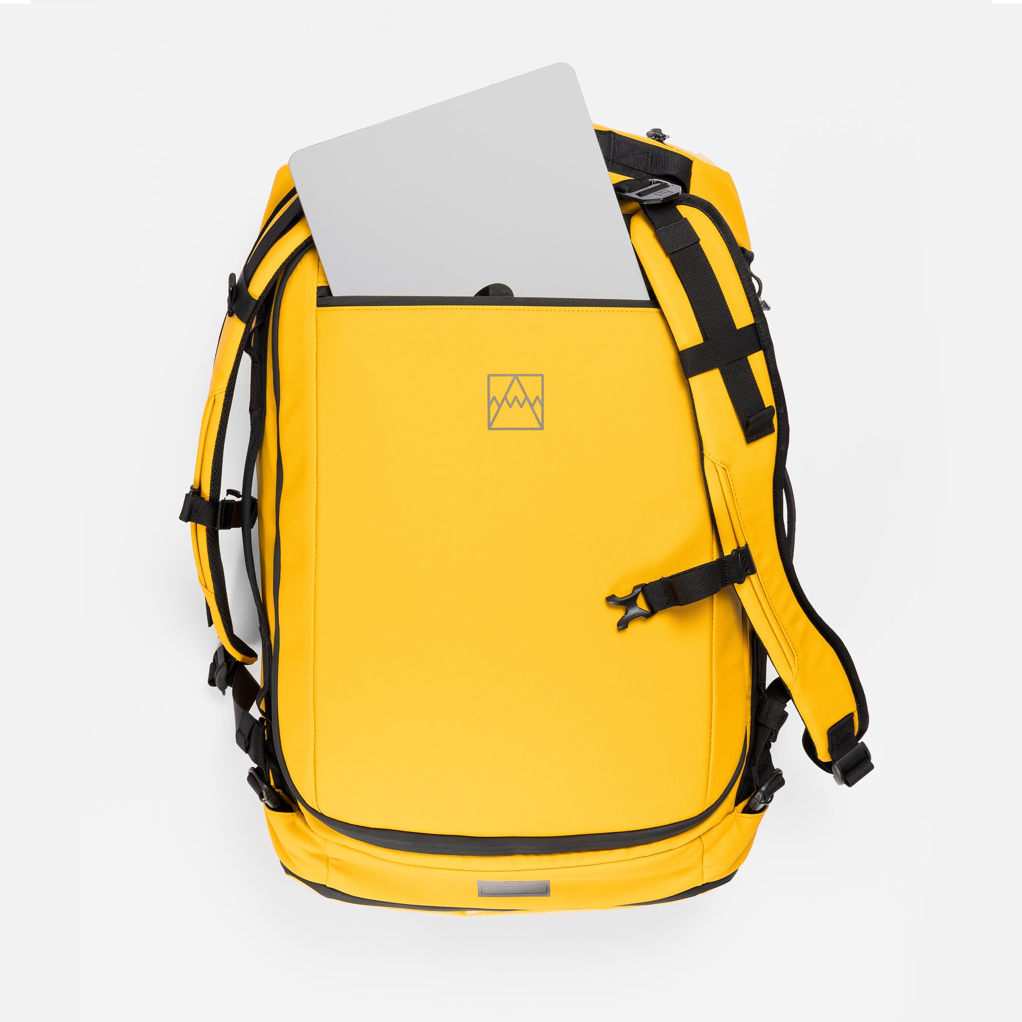 A studio shot of the laptop pocket on a Kit Bag 30L in Yellow