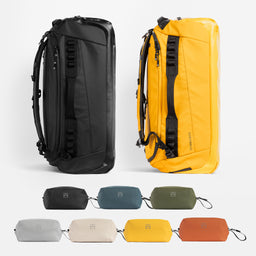 A studio shot of the Kit Bag 65L in yellow and all black with the wash bag all colour bundle [All variants]