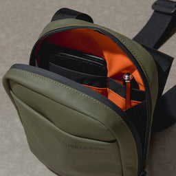 a close up of an Urban Green shoulder bag showing the internal pockets