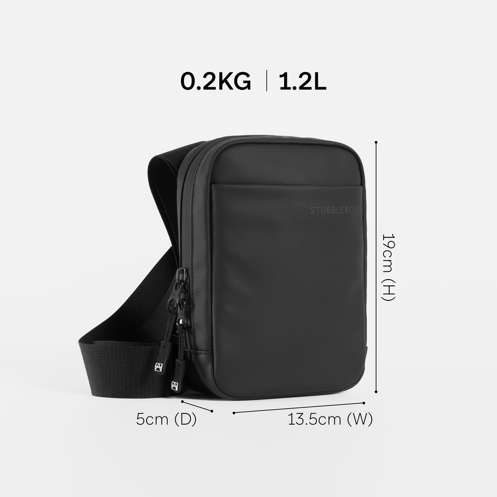 a studio shot of a shoulder bag with the dimensions annotated.